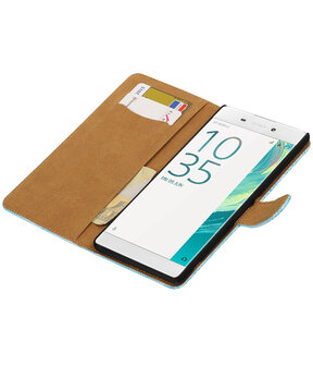 Turquoise Mini Slang booktype wallet cover voor Hoesje voor Sony Xperia C6